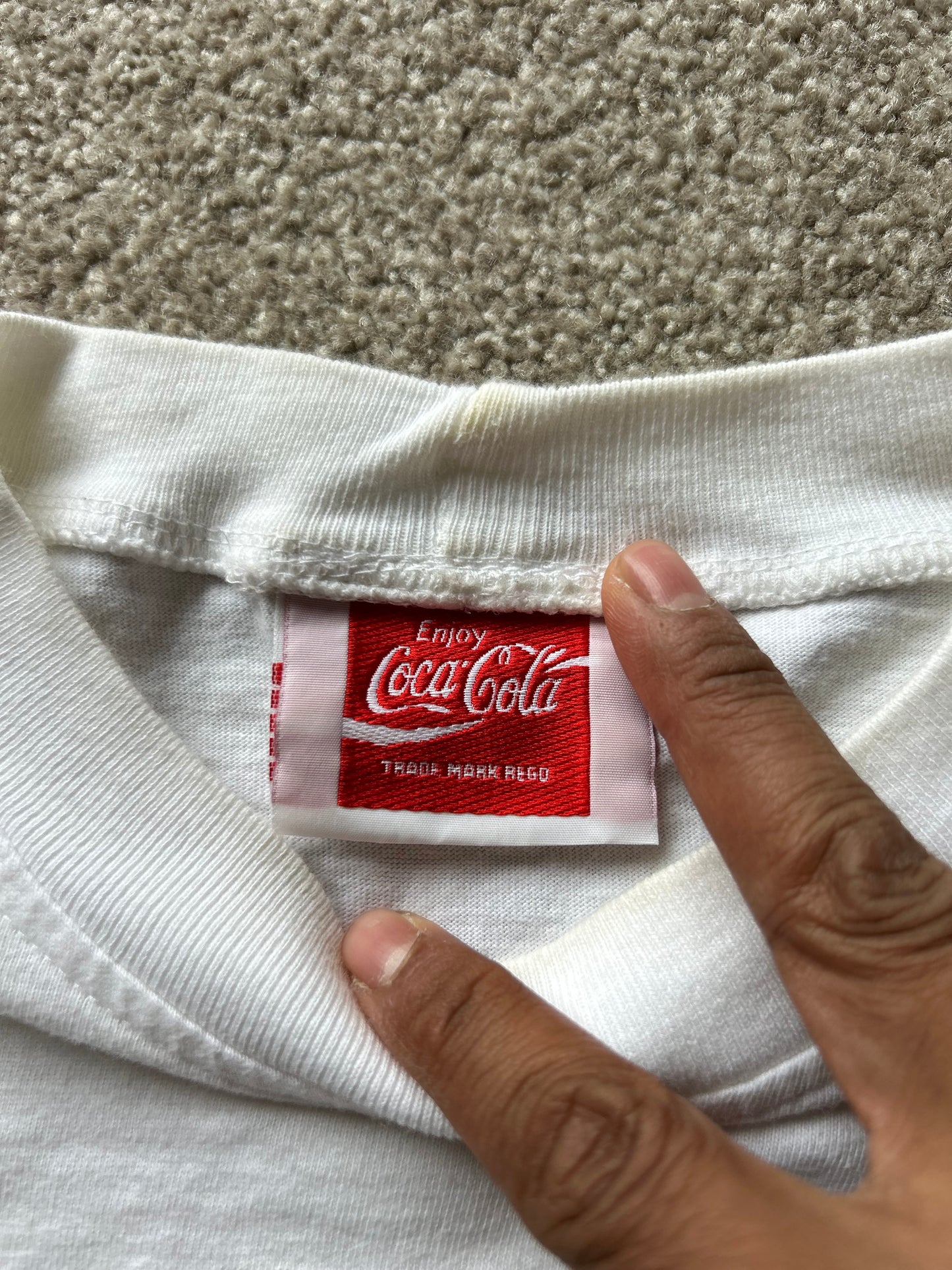 vintage white t-shirt featuring the classic red "Enjoy Coca-Cola" script logo Large