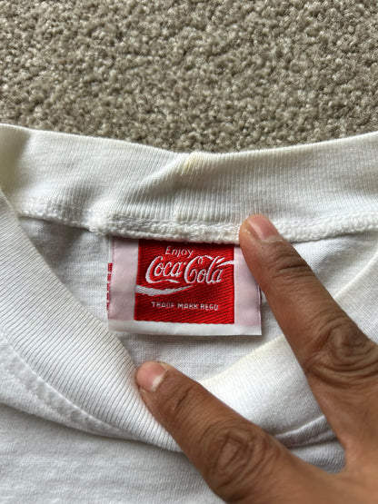 vintage white t-shirt featuring the classic red "Enjoy Coca-Cola" script logo Large