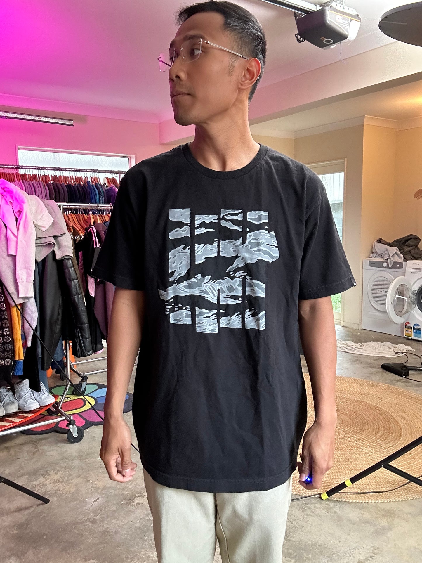 Undefeated and features their iconic five-strike logo filled with a grey camouflage pattern Black Large