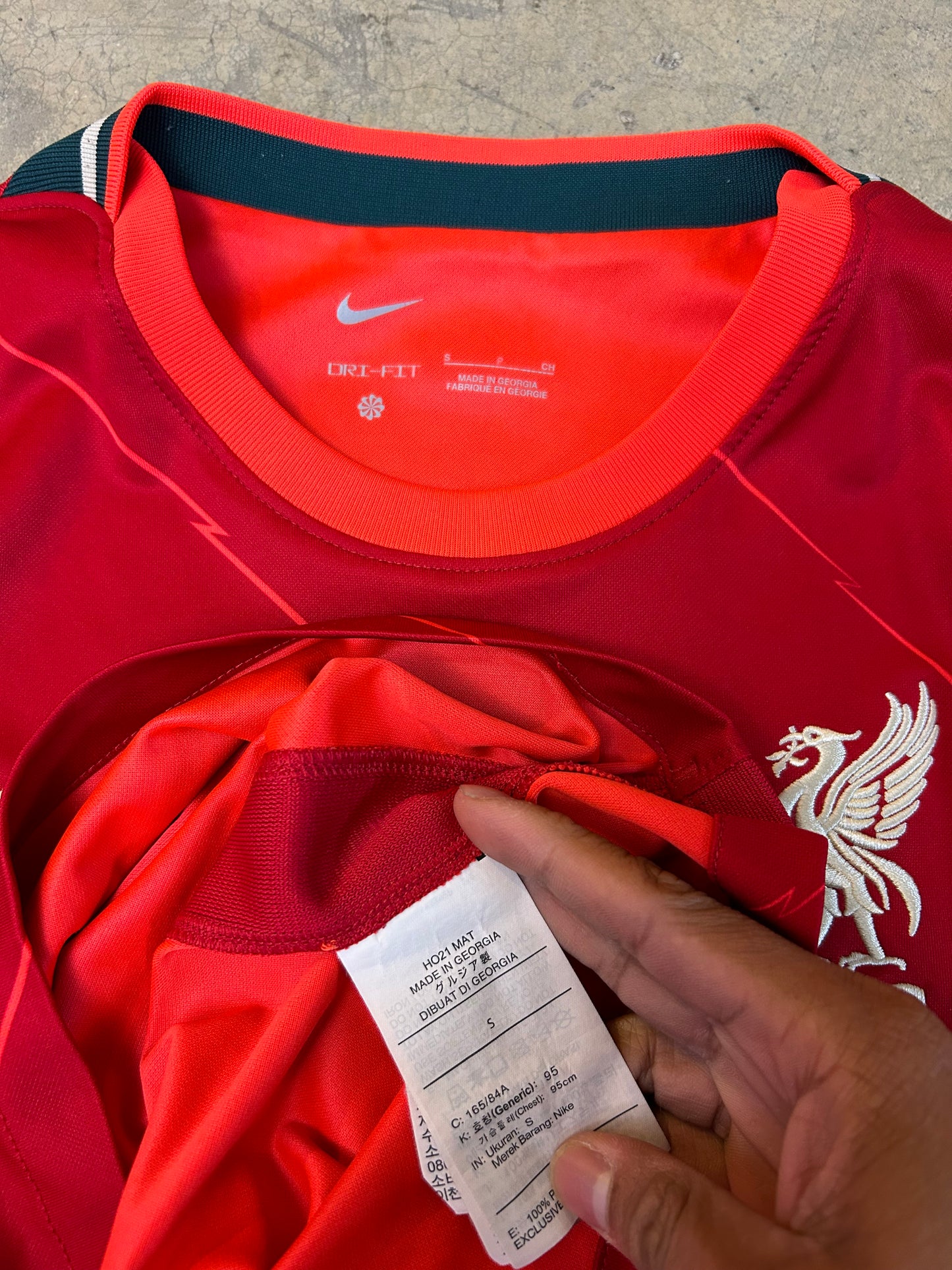 Nike 2021-2022 Liverpool F.C. home jersey in red with white accent details Small