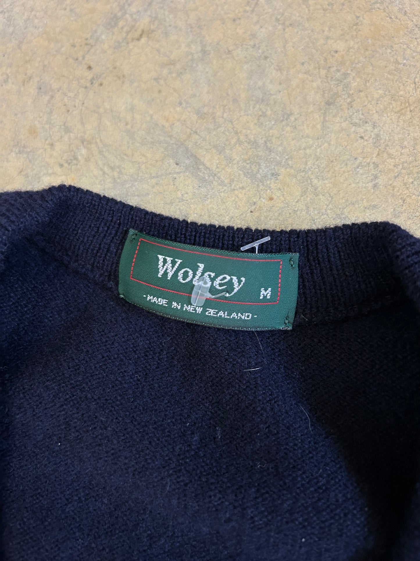navy blue knitted v-neck vest is a vintage Wolsey brand garment made in New Zealand Medium