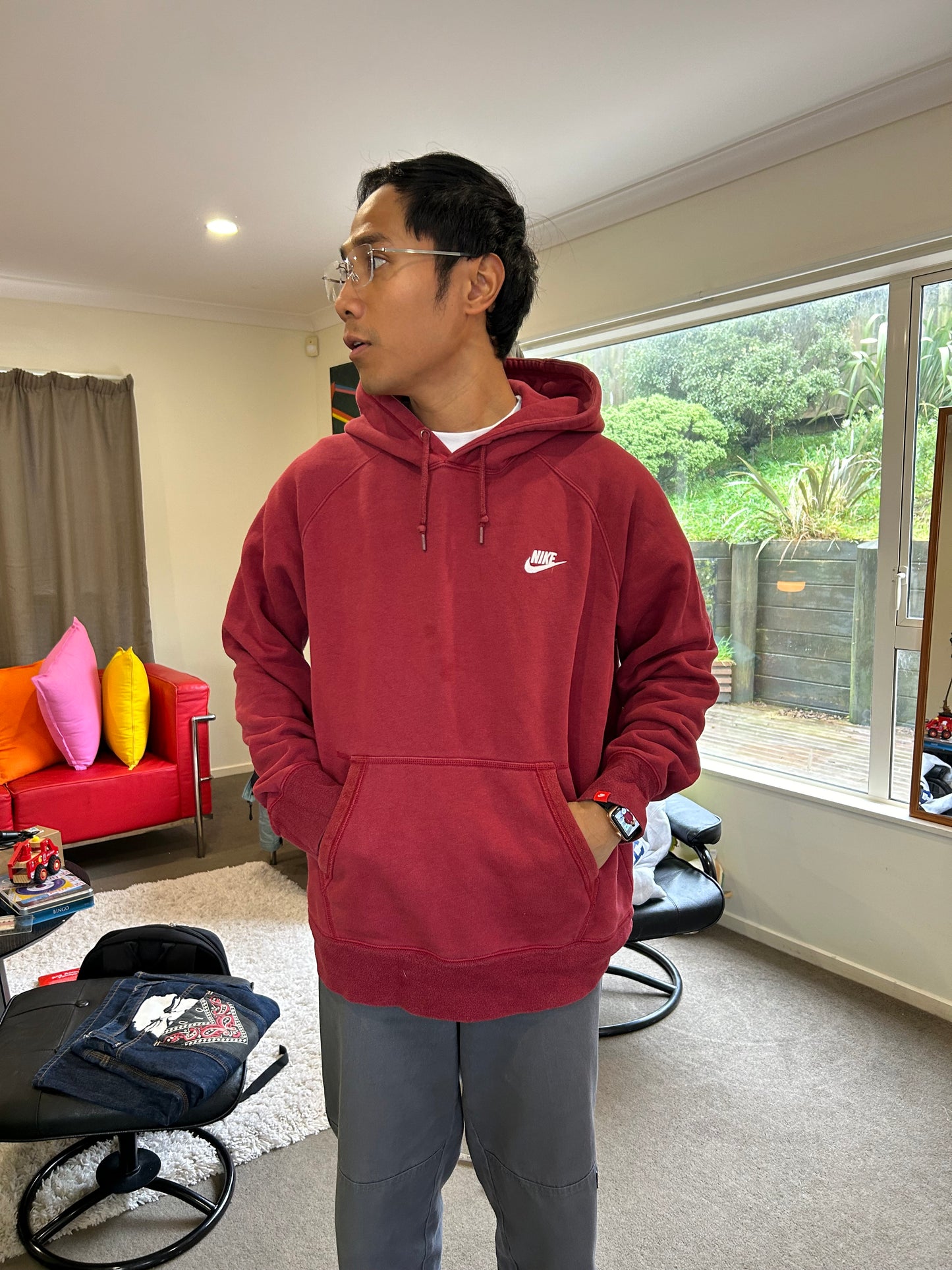 Nike Club fleece hoodie features a rich burgundy color and a classic pullover design with a front kangaroo pocket Large