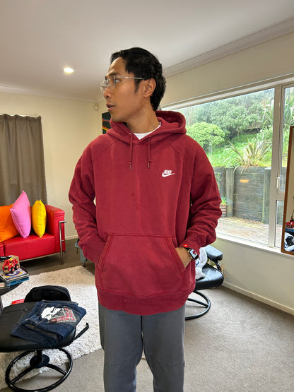 Nike Club fleece hoodie features a rich burgundy color and a classic pullover design with a front kangaroo pocket Large