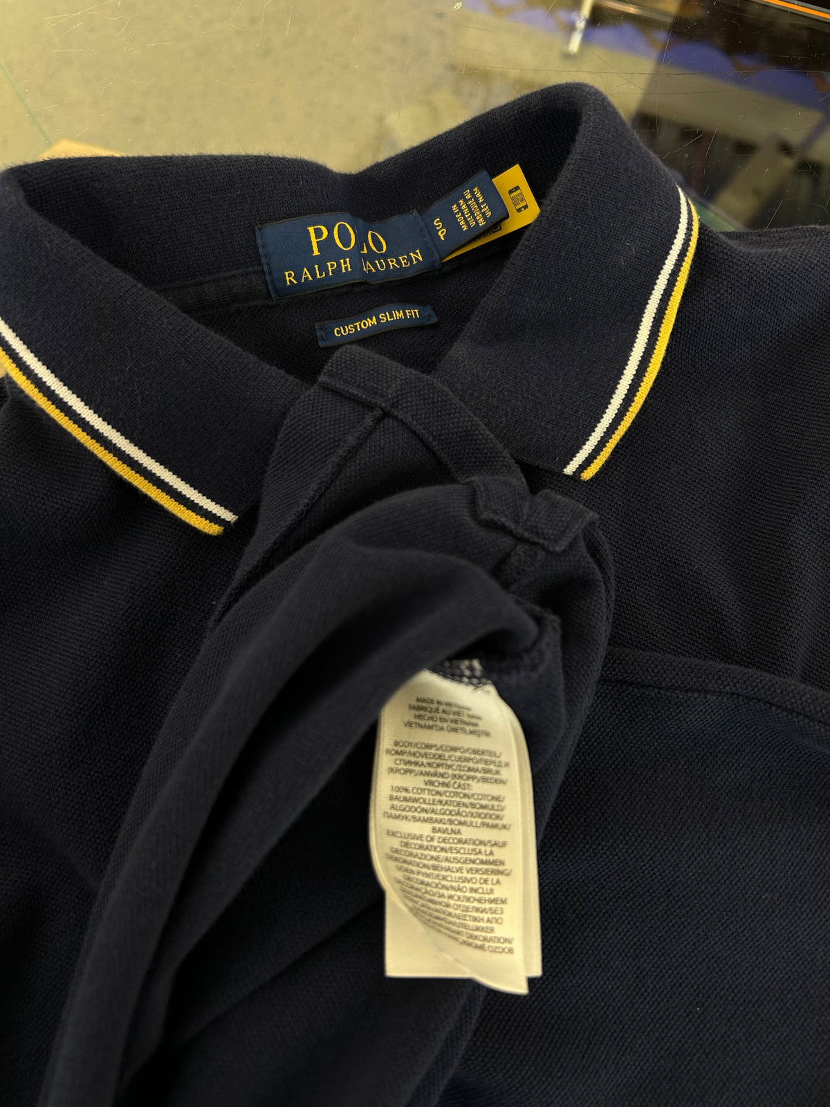 navy blue Polo Ralph Lauren custom slim-fit piqué polo shirt detailed with yellow and white tipped collar and sleeve trim, plus a yellow embroidered pony logo Small