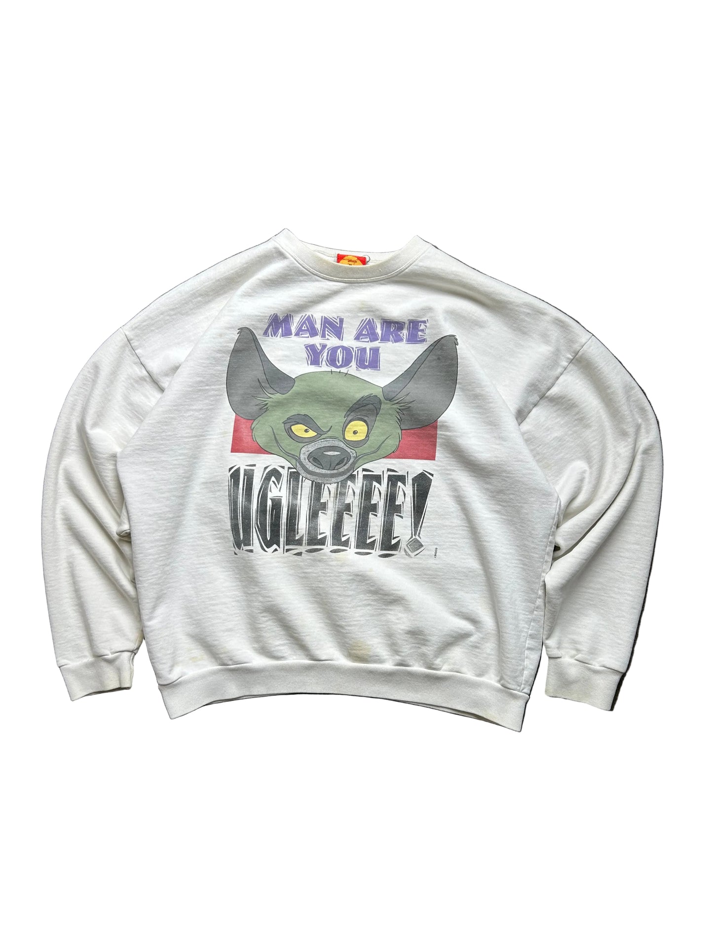 vintage white crewneck sweatshirt features a large graphic of Ed the hyena from The Lion King with the text "MAN ARE YOU UGLEEEE Large