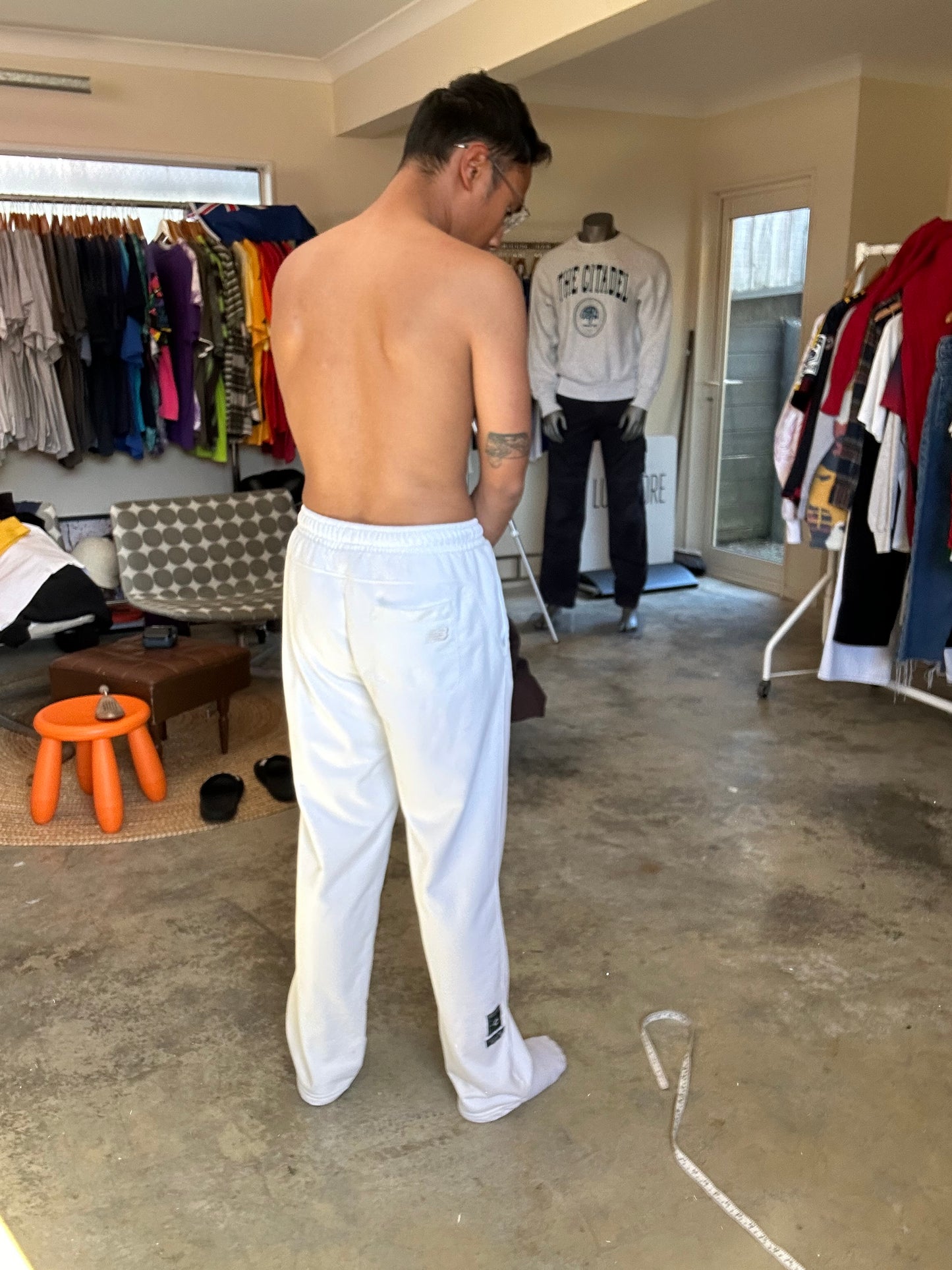 New Balance Essentials Varsity Fleece Sweatpants in a white colorway Medium
