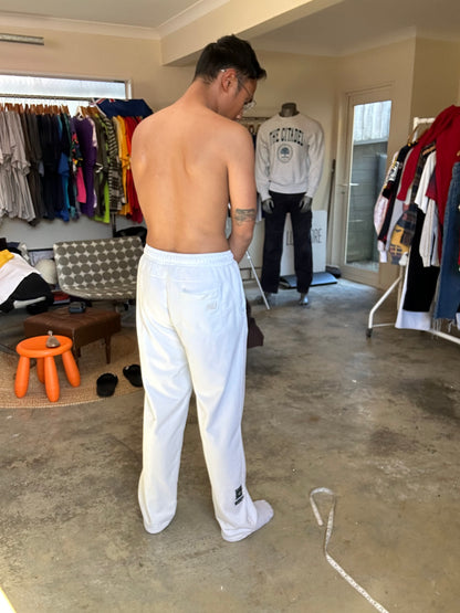 New Balance Essentials Varsity Fleece Sweatpants in a white colorway Medium
