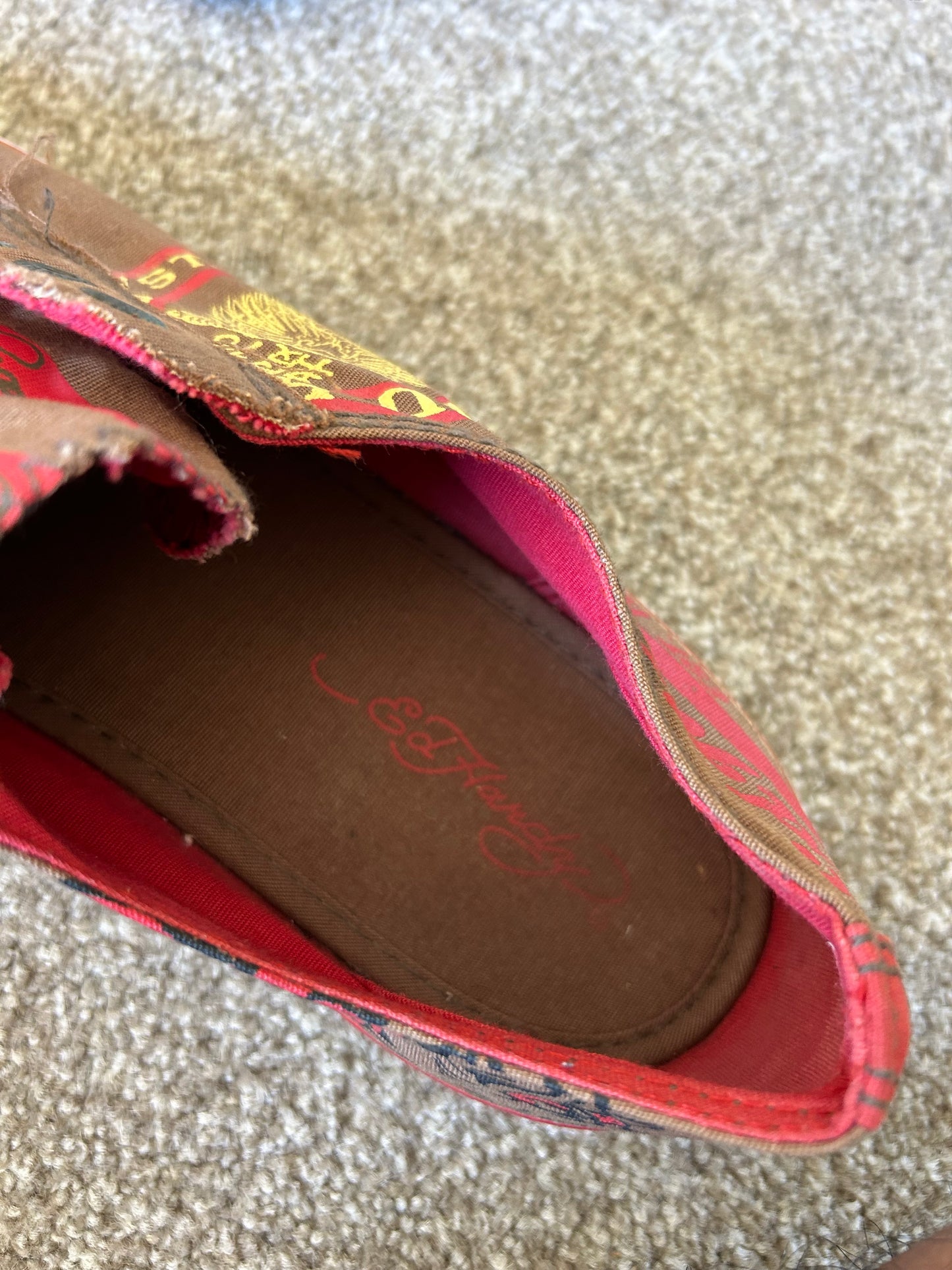 Ed Hardy slip-on canvas sneakers in brown and red with graphic prints.l Brown size US 10 EU 44