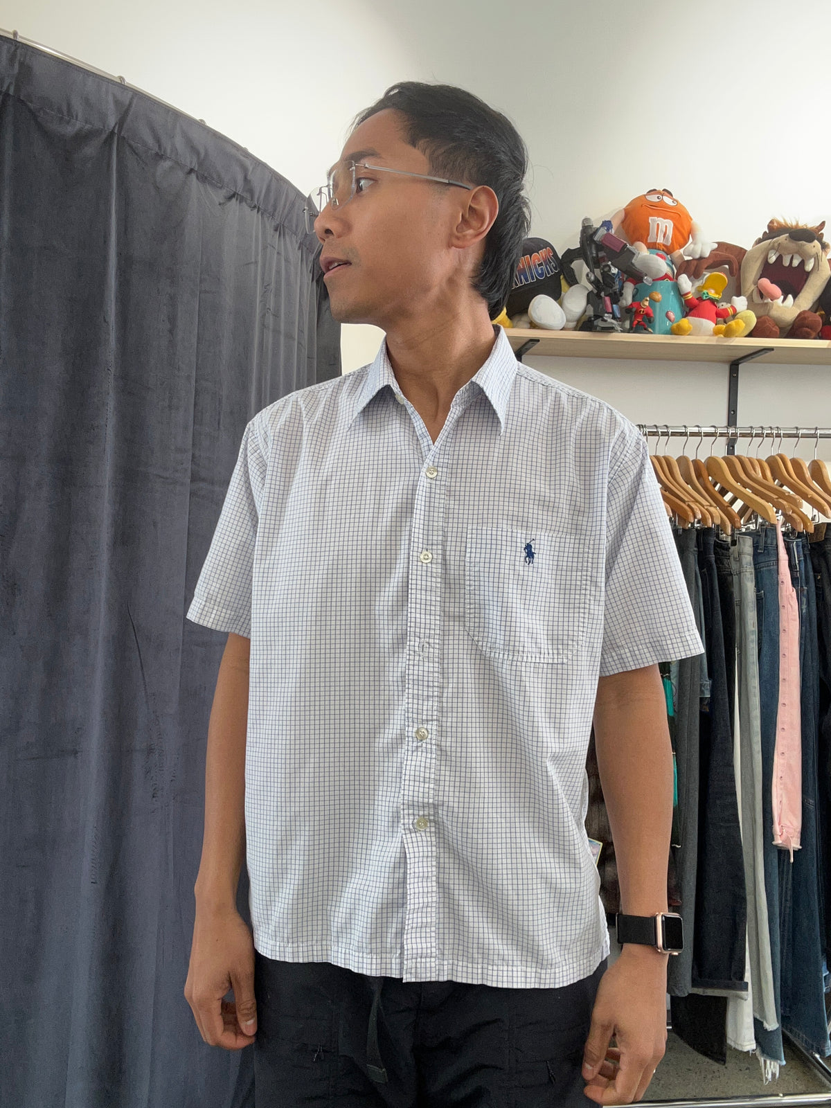 Vintage light blue and white grid-check (graph-check) short-sleeve button-down shirt by Polo Jeans Co. / Ralph Lauren featuring a small dark pony logo embroidered on the chest pocket.