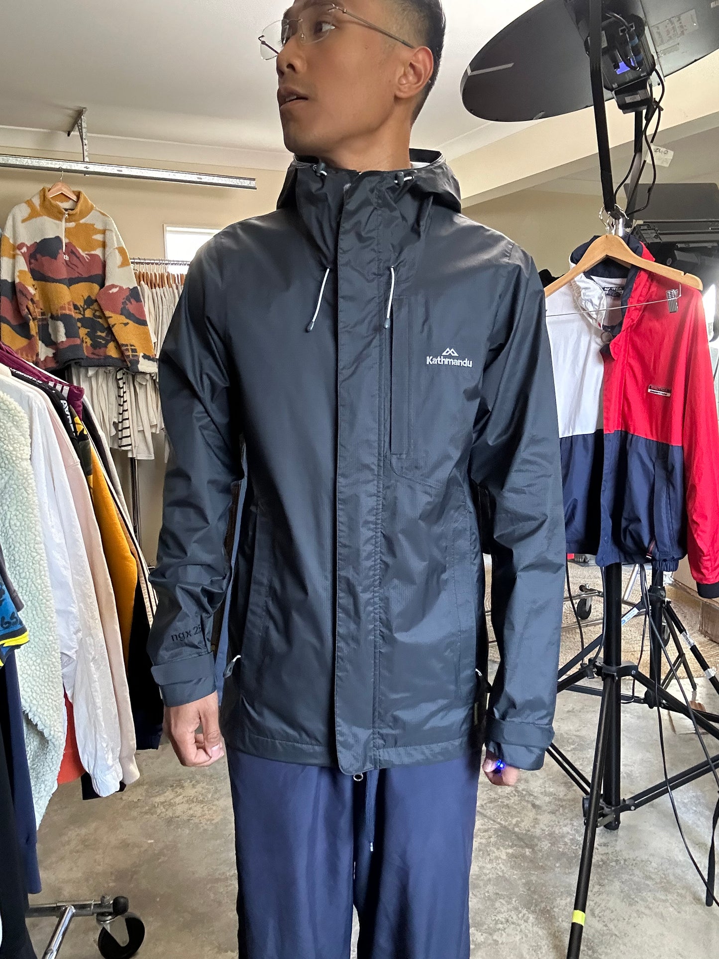 Kathmandu Trailhead Men's NGX Rain Jacket is a durable, waterproof, and highly breathable garment designed for wind and rain Small Black