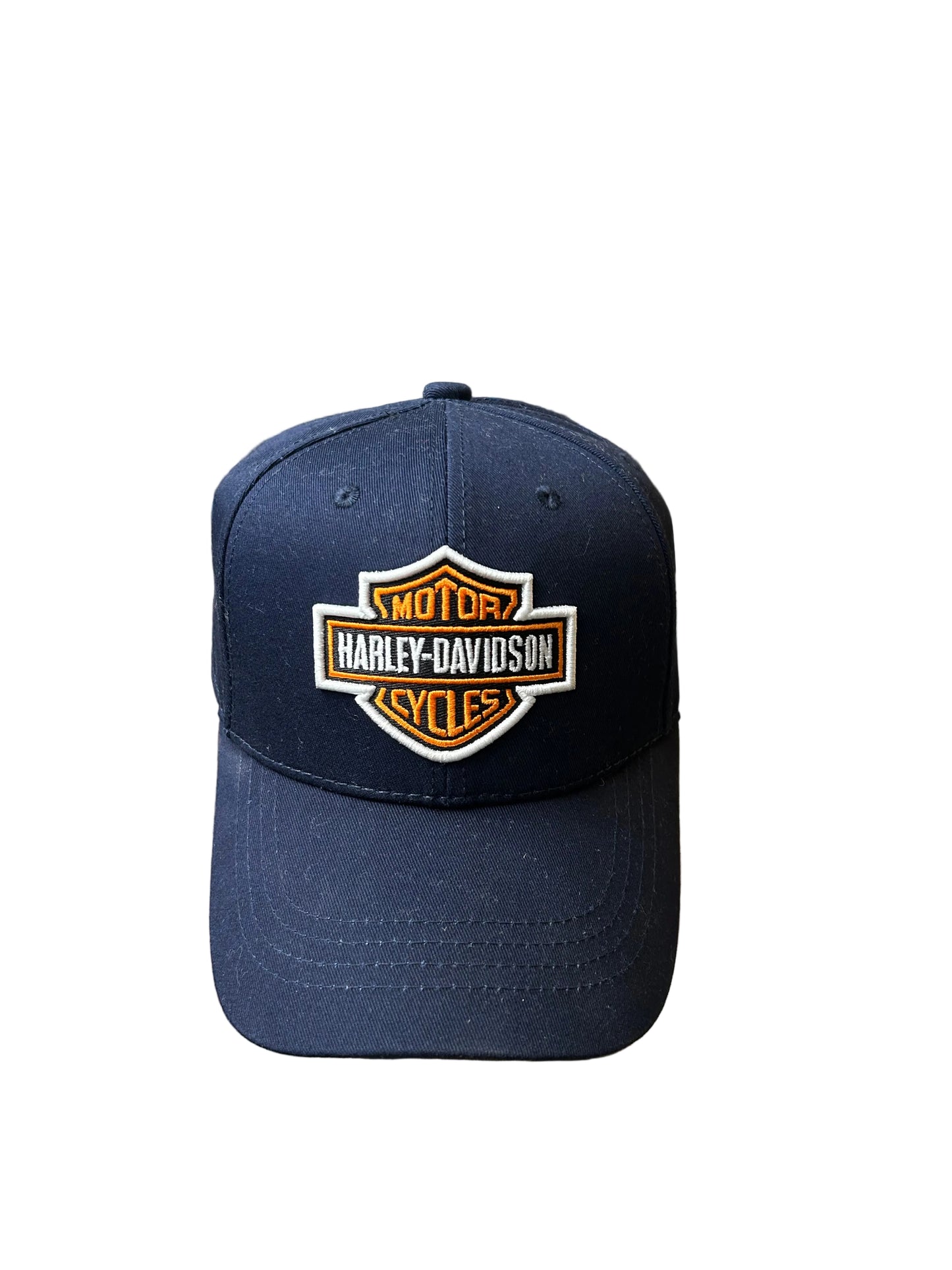 dark navy Harley-Davidson baseball cap features a prominent embroidered bar and shield logo on the front OSFa