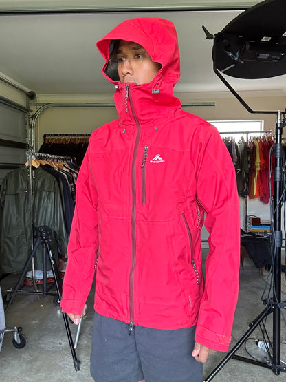 Macpac Lightweight Prophet Rain Jacket, a technical alpine hardshell designed for extreme conditions above the snowline Alpine Series Medium Red