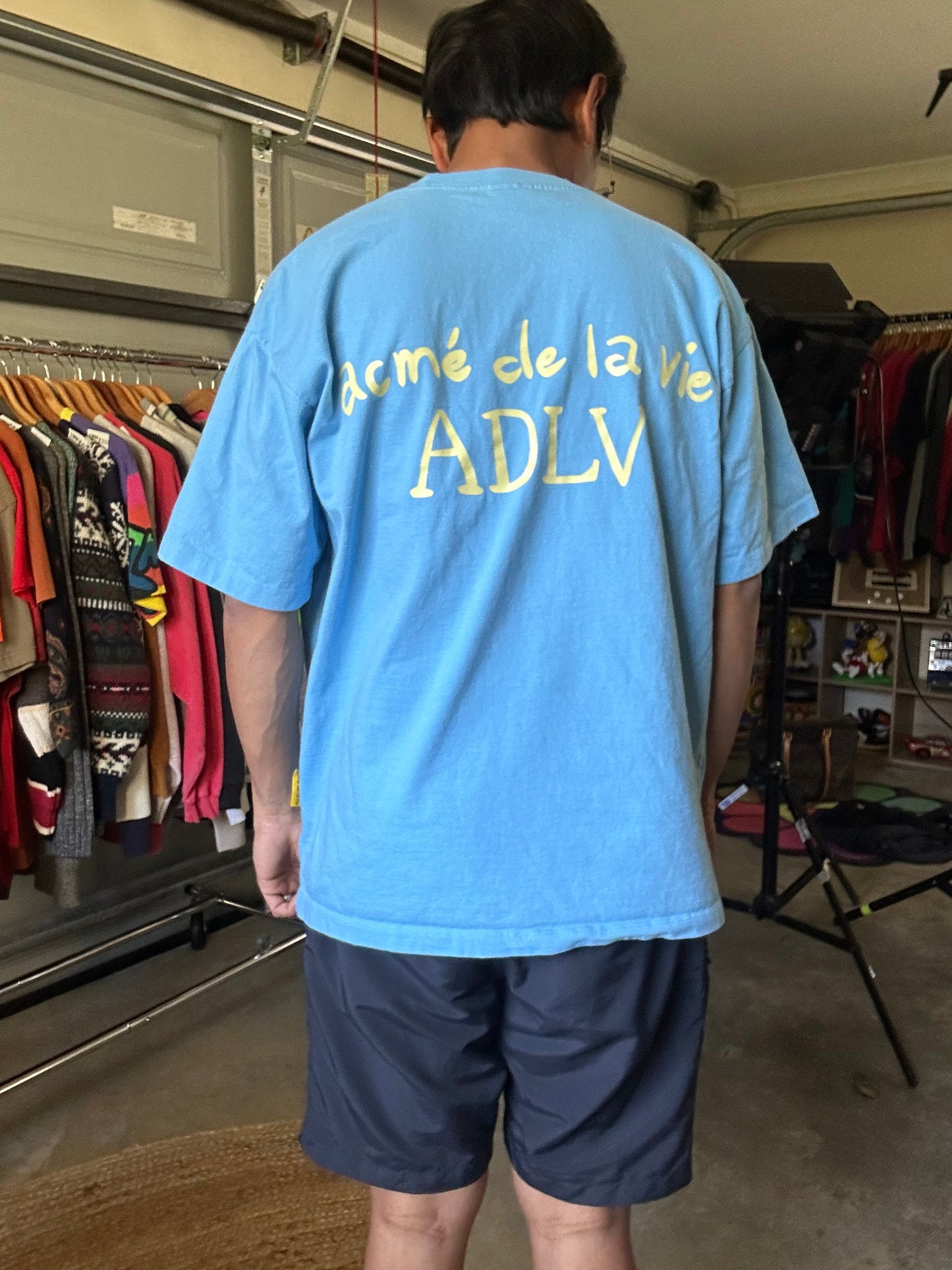 Acmé de la vie (ADLV) Glossy Basic Logo Short Sleeve T-Shirt in blue. Large