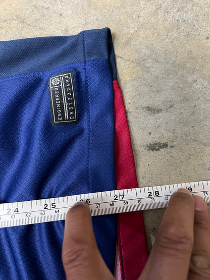Nike FC Barcelona 2024/25 Home Jersey features a distinct split red and blue design with a gold Nike Swoosh