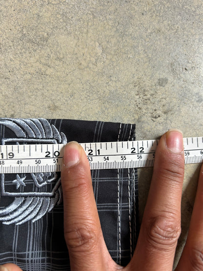 2000s Billabong black and grey plaid board shorts featuring a large embroidered logo on the back 32