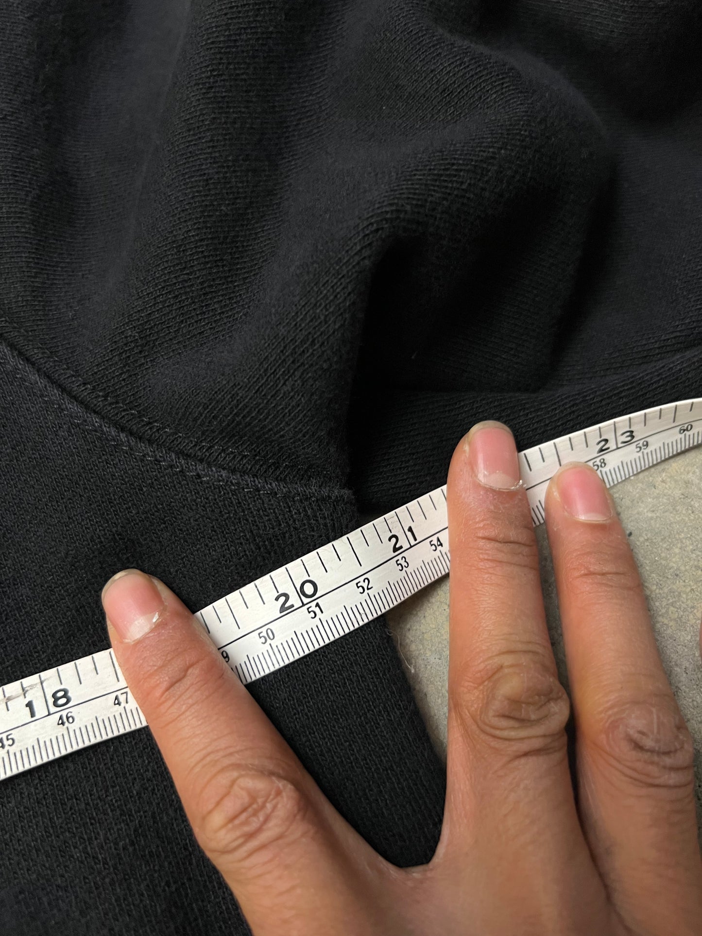 black Subtype Curated hoodie features a prominent kangaroo pocket and a clean, minimalist design Small