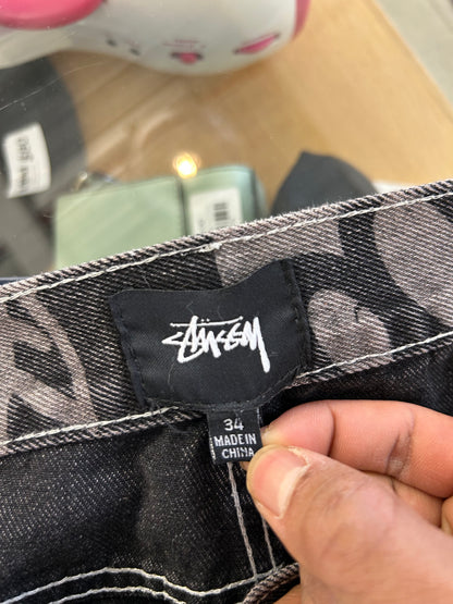 black Stüssy Stock 8 Big OL Jeans featuring an all-over washed graphic print of the brand's iconic 8-ball and stock logo 34