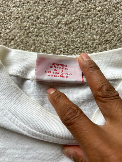 vintage white t-shirt featuring the classic red "Enjoy Coca-Cola" script logo Large