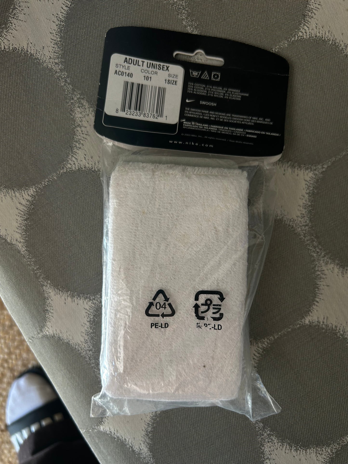 pair of Vintage new white Nike Swoosh double-wide wristbands
