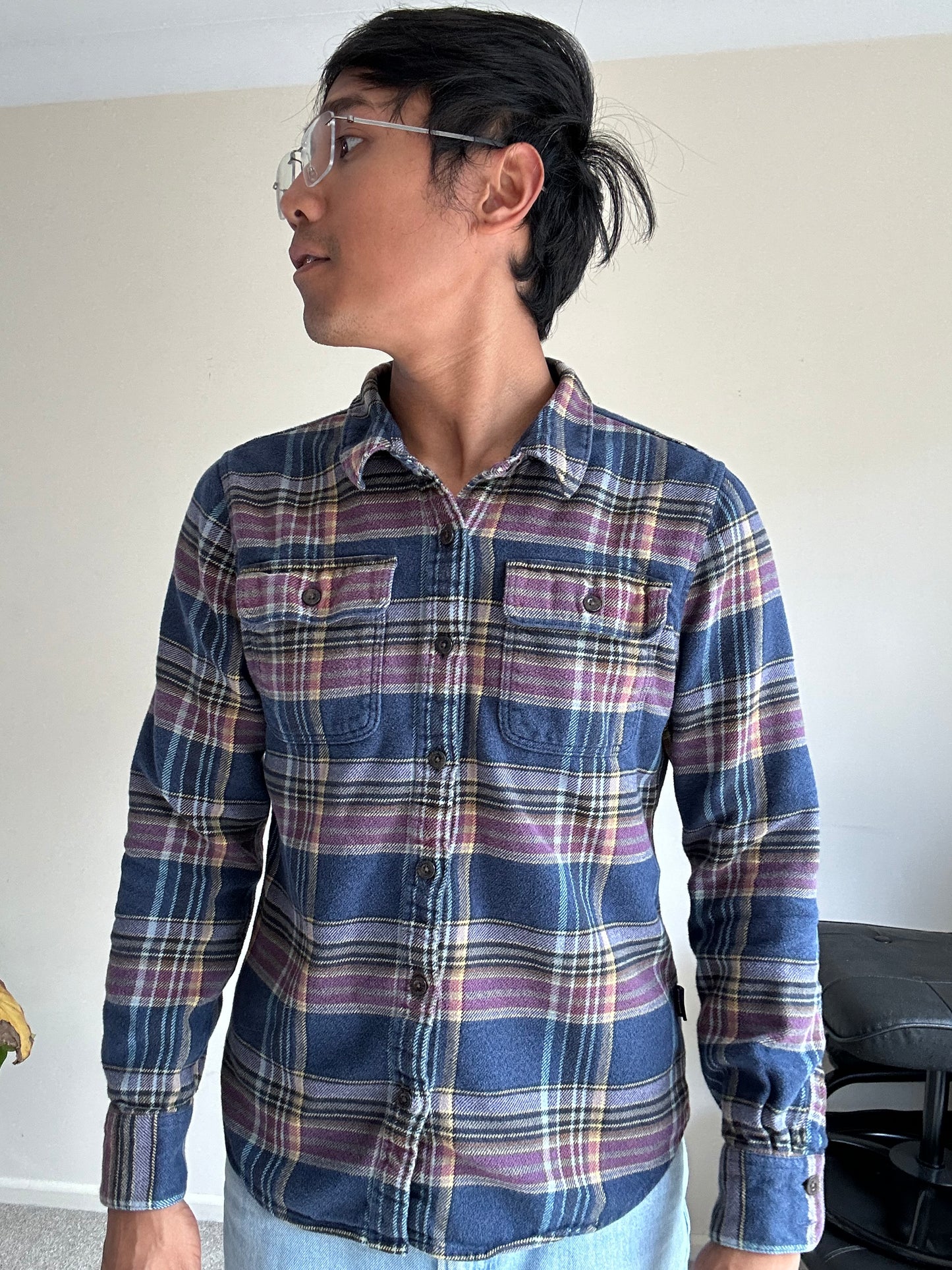 Patagonia Women's Long-Sleeved Fjord Flannel Shirt in a blue and purple plaid pattern, made from 100% organic cotton