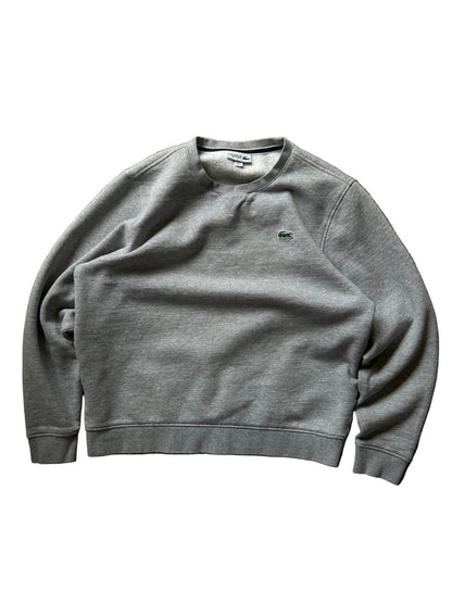 Lacoste grey crew neck sweatshirt, a classic staple from the brand known for its sporty yet stylish aesthetic. Large
