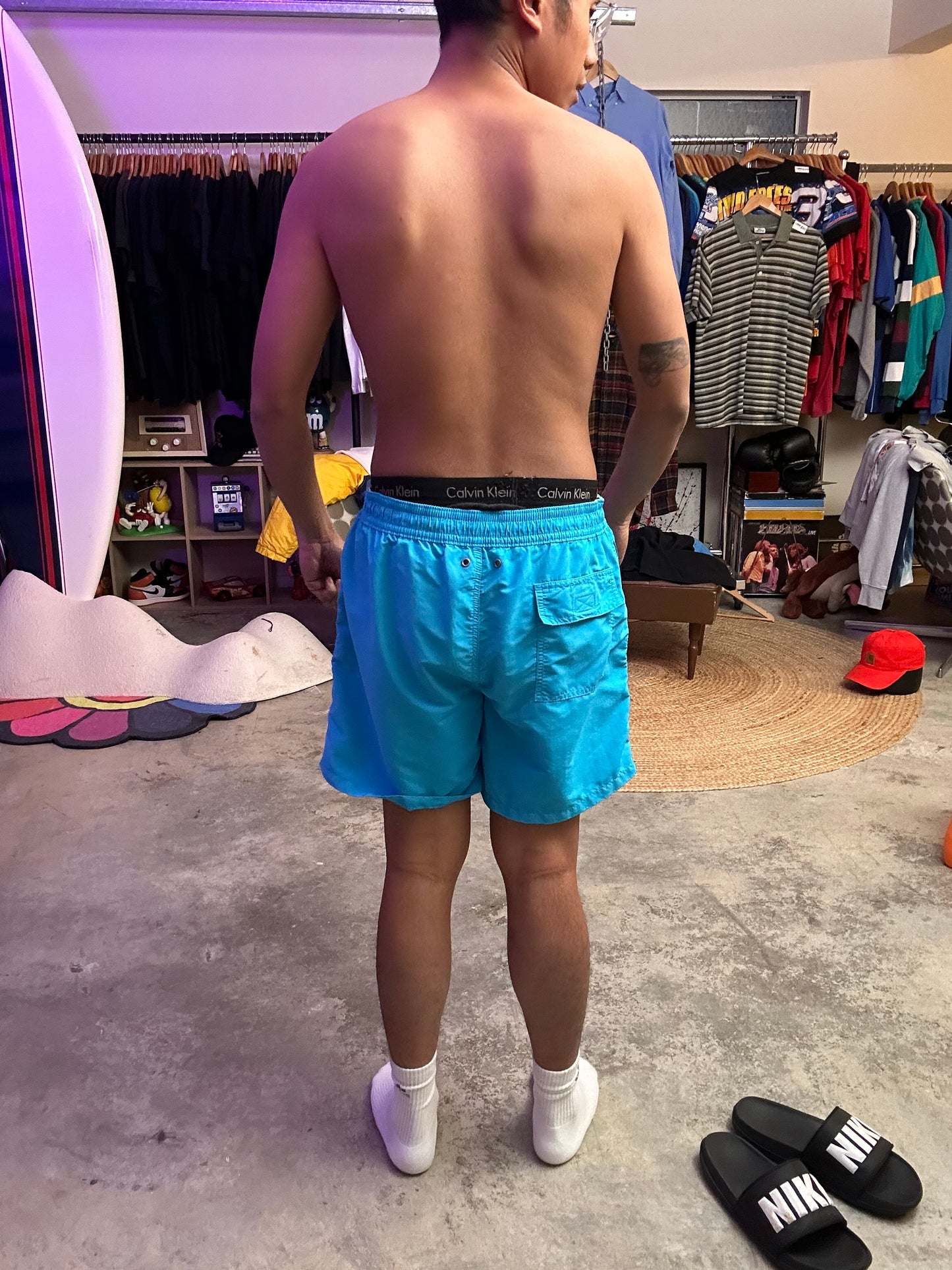 Ralph Lauren swim trunks featuring a blue body with a yellow pony logo Shorts Large