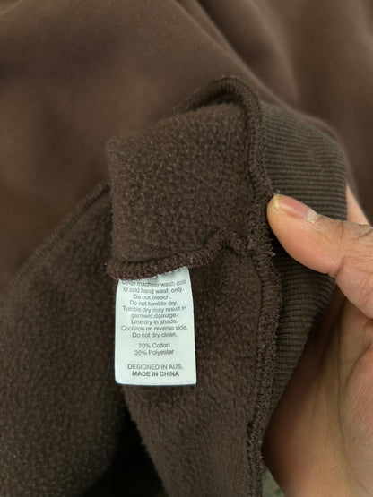 brown Barney Cools hoodie features a small white embroidered logo on the chest and a relaxed, boxy fit. Large