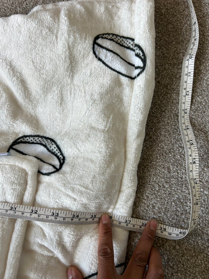 Jed's branded wearable blanket hoodie, "Oodie Cream