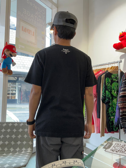 black AAPE by A Bathing Ape t-shirt featuring a vibrant rainbow gradient Ape Head logo on the chest Medium