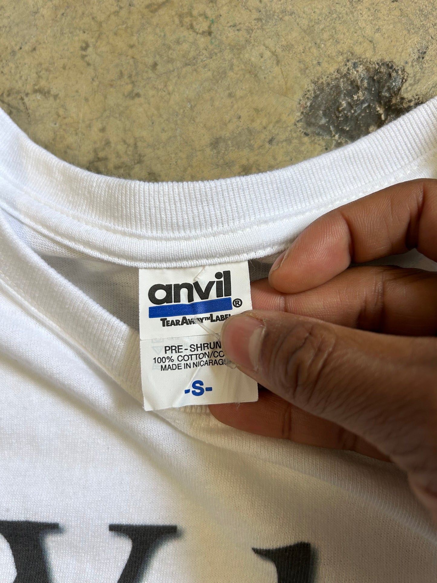 white cotton t-shirt featuring a "Wellington" graphic Small Anvill Blue Tag