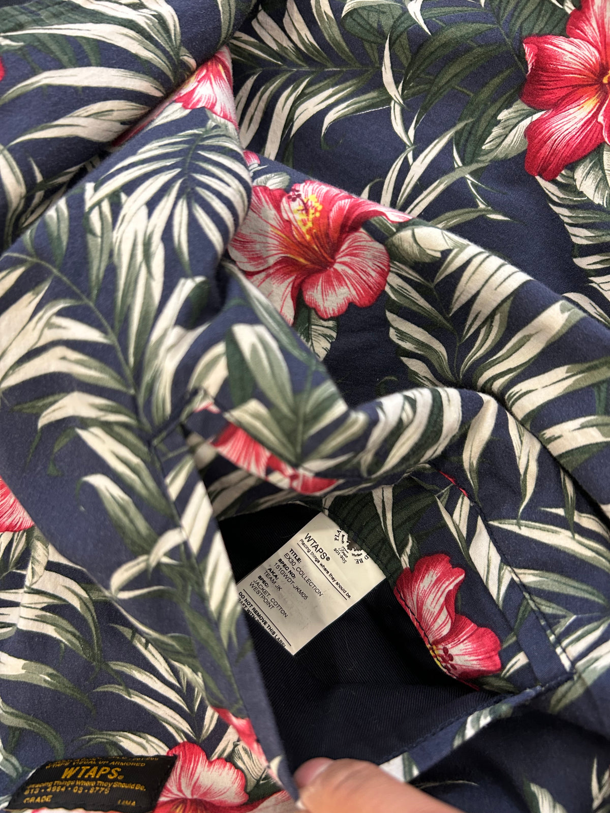 WTAPS 15SS Team Reversible Jacket (often called the Team JKT), featuring a Detroit Tigers-style "D" logo on the chest and a reversible floral/hibiscus lining Large