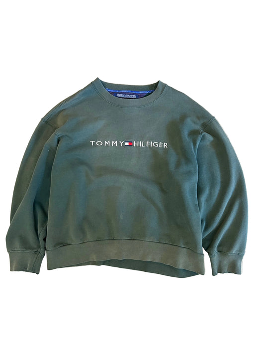 vintage Tommy Hilfiger crew neck sweatshirt in a faded forest green color featuring an embroidered logo on the chest.